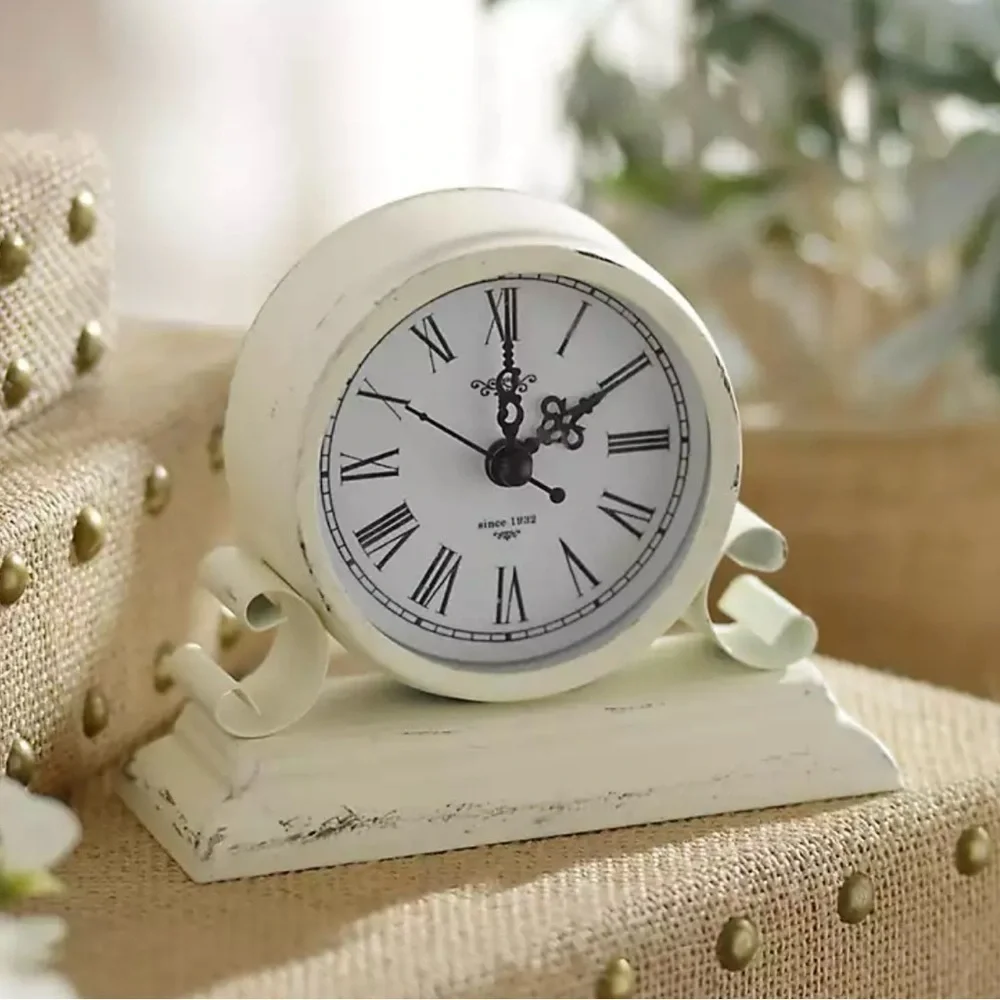 Kirkland’s Distressed Ivory Metal Tabletop Clock